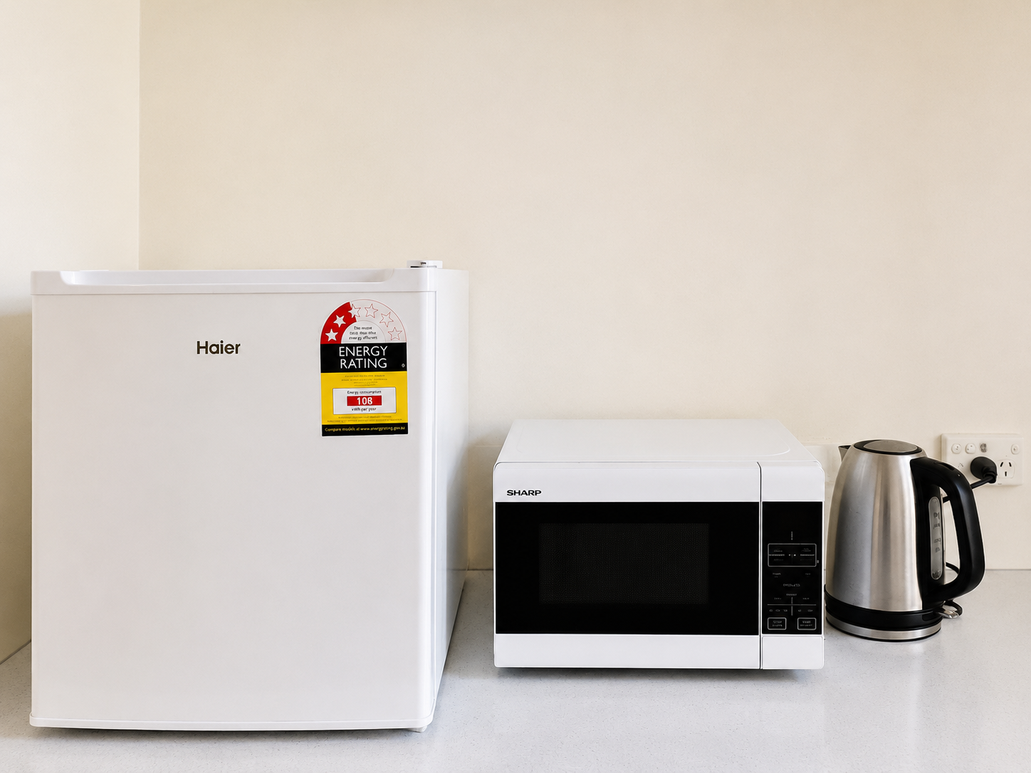 In-room kitchenette with fridge, microwave and kettle